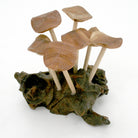 Modern Eastern by Contrast Inc. Decor Six Flat Mushrooms with Two Buds on Driftwood